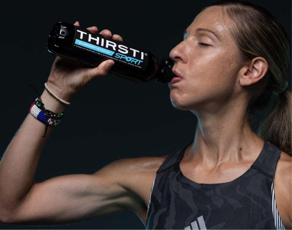 Athlete drinking THIRSTI Sport Blueberry